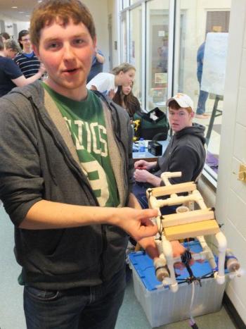 Dan Murray poses with his Seaperch robot. Murray and his partner Alex Owen placed second in the contest. RYAN LEIGHTON/Boothbay Register Dan Murray poses with his Seaperch robot. Murray and his partner Alex Owen placed second in the contest. RYAN LEIGHTON/Boothbay Register