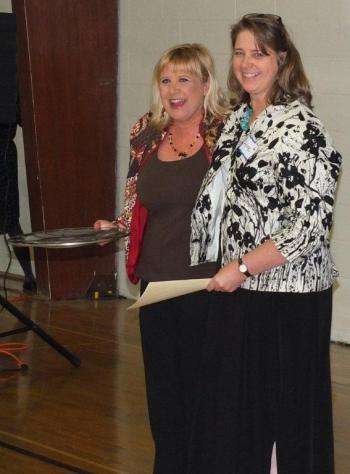 Ginny Bishop, left, receives the Character Development Award from presenter Anne Barker. RYAN LEIGHTON/Boothbay Register Ginny Bishop, left, receives the Character Development Award from presenter Anne Barker. RYAN LEIGHTON/Boothbay Register