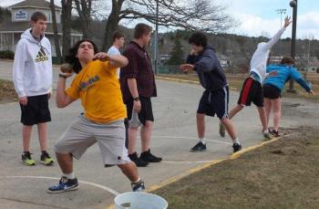 Antonio Maulolo, a new face on the team, is learning the technique of throwing the shot put. RYAN LEIGHTON/Boothbay Register Antonio Maulolo, a new face on the team, is learning the technique of throwing the shot put. RYAN LEIGHTON/Boothbay Register