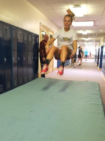Morgan Crocker practices the long jump in the “all weather training facility” on the second floor of BRHS. RYAN LEIGHTON/Boothbay Register Morgan Crocker practices the long jump in the “all weather training facility” on the second floor of BRHS. RYAN LEIGHTON/Boothbay Register