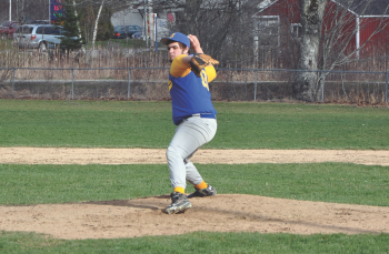 Linc Simmons fires a pitch during the second inning of action of the Boothbay Region High School boys varsity baseball game Monday, April 22. The Seahawks would fall to Carrabec, 14-1. Below: Nick Kilgus connects with a pitch, and Jared Spofford delivers a pitch in the third inning. Spofford was called in out of the bullpen and promptly fanned a Carrabec batter. BEN BULKELEY/Boothbay Register Linc Simmons fires a pitch during the second inning of action of the Boothbay Region High School boys varsity baseball game Monday, April 22. The Seahawks would fall to Carrabec, 14-1. BEN BULKELEY/Boothbay Register