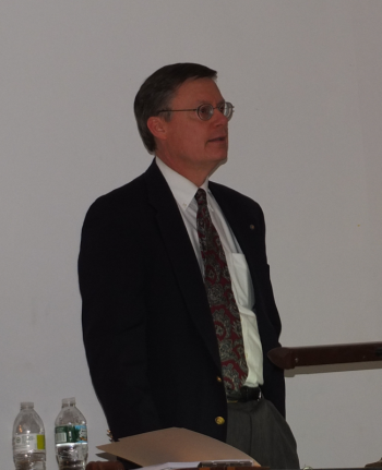 Moderator Carl "Chip" Griffin announces the election results. RYAN LEIGHTON/Boothbay Register