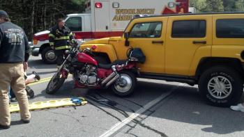 Gary Tilton's motorcycle and Ralph Hall's Hummer after colliding outside Montsweag Roadhouse May 18. JULIE HOSKEER/Boothbay Register