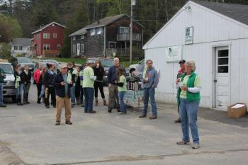 Sally Barter gives initial directions to the crew assembled at the catholic church's parking lot at 7:30 a.m. The high school softball team is pictured at left. Below: Bill Hamblen and Derek Abbot make repairs at a house on King Phillips Trail. SUE MELLO/Boothbay Register Sally Barter gives initial directions to the crew assembled at the catholic church's parking lot at 7:30 a.m. The high school softball team is pictured at left. SUE MELLO/Boothbay Register