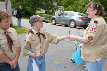 Ethan Barter, center, receives his Arrow of Light designation from his mother and Assistant Cubmaster Bonnie Wormwood. Courtesy of Cubmaster Sarah Sherman