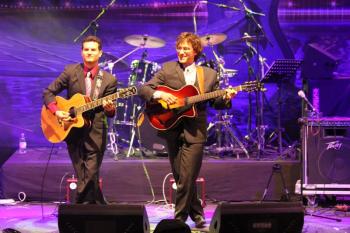 Guitarists Vinny Raniolo, right, and Frank Vignola during a performance at the Opera House in 2012. Brought back by popular demand, the pair return to the Opera House stage  on July 18. Robert Mitchell photo