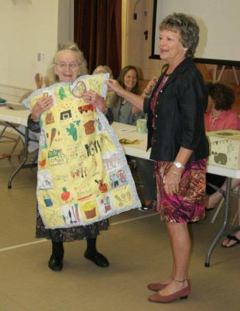 Ramona Gaudette holds the quilt presented to her by school guidance counselor Mrs. Buchan. KEVIN BURNHAM/Boothbay Register Ramona Gaudette holds the quilt presented to her by school guidance counselor Mrs. Buchan. KEVIN BURNHAM/Boothbay Register