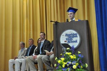 Evan Stevens delivers the Honor Essay as school representatives listen. BEN BULKELEY/Boothbay Register Evan Stevens delivers the Honor Essay as school representatives listen. BEN BULKELEY/Boothbay Register