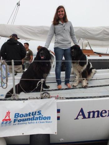 Michelle Levano, a summer intern, poses with Newfoundlands Smudge and Hickory, the furry mascots of the Rozalia Project. RYAN LEIGHTON/Boothbay Register Michelle Levano, a summer intern, poses with Newfoundlands Smudge and Hickory, the furry mascots of the Rozalia Project. RYAN LEIGHTON/Boothbay Register