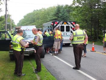 LCSO responds to a second motor vehicle accident on July 9. Driver James Norman of Boothbay Harbor, 70, is loaded into a stretcher and transported to St. Andrews Hospital. RYAN LEIGHTON/Boothbay Register