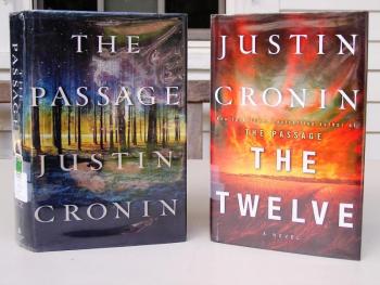 Two of three novels in "The Passage" trilogy by Justin Cronin. Courtesy of Boothbay Harbor Memorial Library