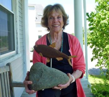 Myrna Snider of East Boothbay proudly holds the alewife sculpture she won at the Fish Ladder Festival. Courtesy of Deb Wilson