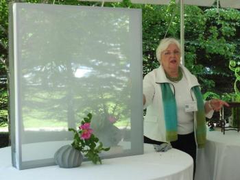 Sandra Leonard, seasonally of Southport, demonstrates the "transparencies"display technique. LISA KRISTOFF/Boothbay Register Sandra Leonard, seasonally of Southport, demonstrates the "transparencies" technique. LISA KRISTOFF/Boothbay Register