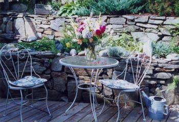 A view from the kitchen of the lily pond and walls. Courtesy of Carlton Plummer