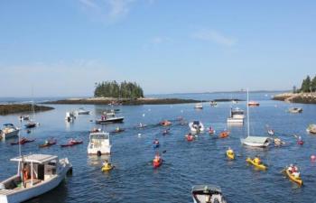 Under sunny skies, Southport Rowgatta paddlers depart from Newagen Harbor to round Southport Island and finish where they begain. SUE MELLO?Boothbay Register