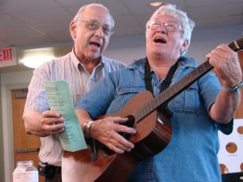 Wiscasset Selectmen's Chairman Ed Polewarczyk, left, and Donna Waterman lead a sing-along. SUSAN JOHNS/Wiscasset Newspaper