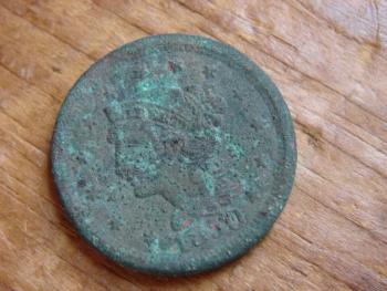 Stephenson found this 1850 coin under the classroom’s floorboards. SUSAN JOHNS/Wiscasset Newspaper Stephenson found this 1850 coin under the classroom’s floorboards. SUSAN JOHNS/Wiscasset Newspaper