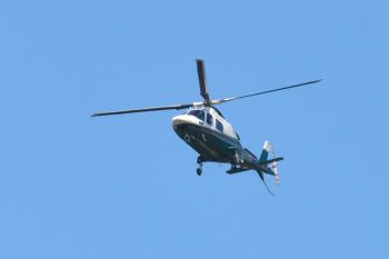The lifeflight chopper was on the scene and the injured were transported to a location away from the scene to be lifted to a hospital. (Photo by Ron Hawkes)