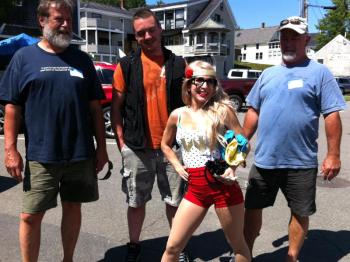 Waffle girl to the rescue! This year, Wannawaf's waffle eating contest for a cause drew its largest crowd and raised over $4,000 in support of the Scott family of Boothbay. Waffle girl, a.k.a Wannawaf owner Anya Arsenault, poses here with the top three eaters of the day. Left to right, Jon Lewis, first runner-up, Max Bare, champion, and Dave Cyco, second runner-up. Courtesy of Lizzie Lewis