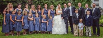 The wedding party gathers on the lawn of the Edgecomb Congregational Church.