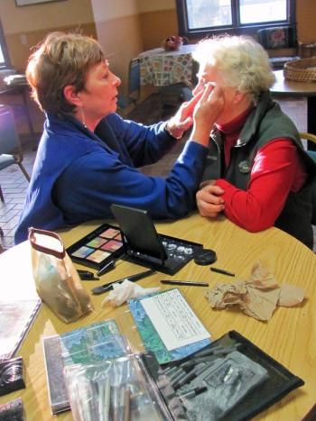 Deborah Walder, Mary Kay director (left), gives a Spectrum Generations friend a new face during a makeover session at Spectrum Generations. Courtesy of Spectrum Generations