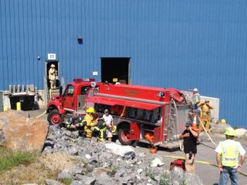 Firefighters get ready to enter Washburn & Doughty on Tuesday afternoon. RYAN LEIGHTON/Boothbay Register