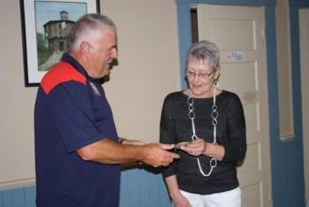 King Lion Mike Giles welcomes new member, Elizabeth McKim. Courtesy of Susie Giles