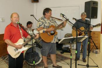 Music for the Hometown Heroes program is provided by, from left, Garry Blackman Sr., Mike Ferrucci, Tim Sprague and Bob Blackman. KEVIN BURNHAM/Boothbay Register