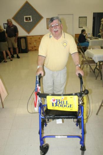 Rotarian Bill Dodge arrives at the Hometown Heroes event with his “personalized” walker. KEVIN BURNHAM/Boothbay Register