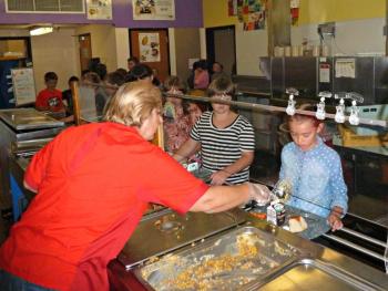 Third and fourth grade students line up to receive heaping spoonfuls of homemade shepherd’s pie from Dawn Sutter for lunch at Boothbay Region Elementary School. KATRINA CLARK/Boothbay Register Third and fourth grade students line up to receive heaping spoonfuls of homemade shepherd’s pie from Dawn Sutter for lunch at Boothbay Region Elementary School. KATRINA CLARK/Boothbay Register