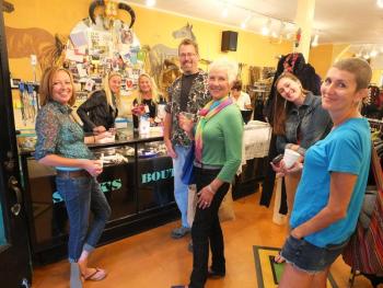 Harbor “crawlers” enjoy the festivities at Slicks boutique in Boothbay Harbor.  RYAN LEIGHTON/Boothbay Register