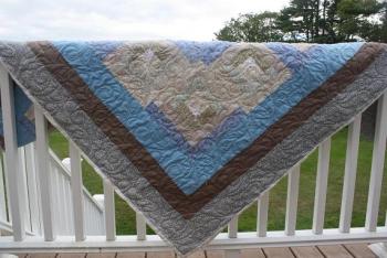 QUILT RAFFLE. The Boothbay Region Lions Club is holding a quilt raffe. Lion Susie Giles made the quilt and Lynn Irish did the quilting on the top. It's a “Log Cabin Handmade quilt” and those who want to buy a raffle ticket can call Giles (207-633-3640) or any Lions Club member. Courtesy of the Lions Club