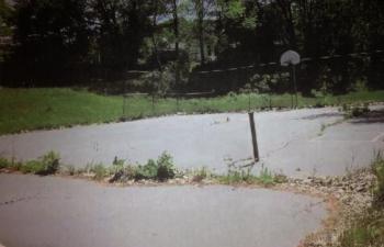 You don't say: A May 29 inspection determined this one-time tennis and game court at the former Eddy School site in Edgecomb isn't up to par. Now a state letter says the town is responsible for replacing it. Courtesy Town of Edgecomb