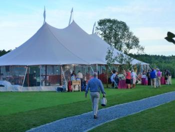 More than 230 guests pack the giant tent set up on the Boothbay Harbor Country Club’s driving range. KATRINA CLARK/Boothbay Register More than 230 guests pack the giant tent set up on the Boothbay Harbor Country Club’s driving range. KATRINA CLARK/Boothbay Register