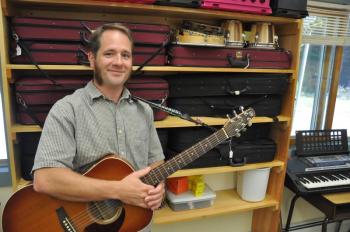 Mark Phillips will be teaching at Southport Central School starting this year. Phillips said he wants students to become inspired by music and to hopefully turn it into a hobby for life. BEN BULKELEY/Boothbay Register
