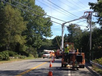 Central Maine Power workers install new power lines along Route 96 to East Boothbay. The projected is slated to be complete by September 23. RYAN LEIGHTON/Boothbay Register