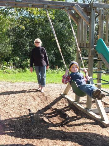 Ethel Stansfield gives Isaac Koskkowski a push on the swing. Stansfield celebrates her 30th year teaching at Sheepscot Valley. RYAN LEIGHTON/Boothbay Register