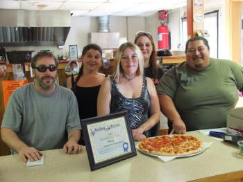 Hometown Convenience won Boothbay’s best pizza contest. From left are Neil Hyson, Amanda Lewis-Giles, Sarah Rogers, Jennifer Brewer and owner Corey Tibbetts. 