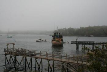 The towing of the Westward begins off Signal Point. Courtesy of Barbara Freeman