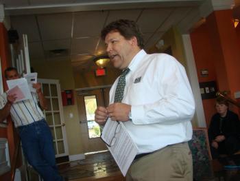 Stefan Keenan of Keenan Auction Company presides over the Coburn House auction on October 18 in Edgecomb. SUSAN :JOHNS/Wiscasset Newspaper