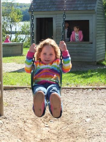 Ella Travis enjoys the swing during morning recess. RYAN LEIGHTON/Boothbay Register