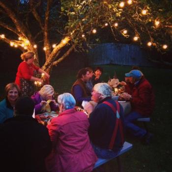 The clambake happened under an apple tree speckled with tiny lights, making a magical scene come alive. RYAN LEIGHTON/Boothbay Register