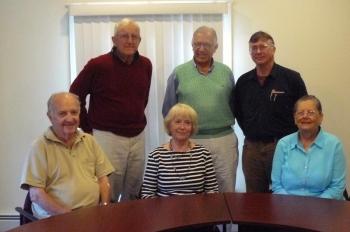 New board members of Boothbay Region Student Aid Fund with BRSAF President Hamilton Meserve, standing, left. Seated, from left, are Charles “Chuck” Koch, Susan Strouss and Diane Randlett. Standing are Nicholas “Nick” Hurd, center, and Brian McGrath. Courtesy of John Bauman/BRSAF
