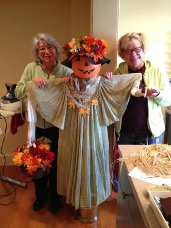 Helping with the pumpkin decorating at St. Andrews Village are, from left, back row: Pat McMurry, Irene Gerny, Nan Jackson, Karen Gilbert, Pam Wilde and Sallie Hemingway; front row: Margaret Holden, Judy Burgess, Kathleen Marty and Mary Gevaudan. Courtesy of Carol Lingard