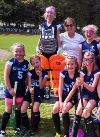 Michelle Bouchard as a field hockey coach. Courtesy of the YMCA