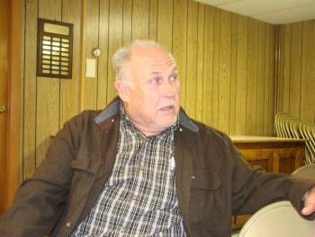 Barry Hathorne, vice chairman of the Edgecomb Planning Board, looks back in the audience to Fire Chief Roy Potter as he explains the board’s decision to make a smaller ordinance review committee that does not include Potter as a voting member. SUSAN JOHNS/Wiscasset Newspaper