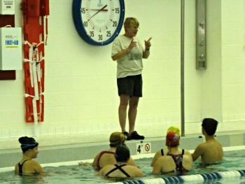 Volunteer Cindy Young coaches the students who have never swam competitively before. KATRINA CLARK/Boothbay Register