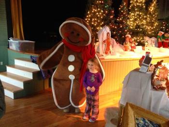 The Gingerbread man took time out of his job search to pose with Lee Stoddard's granddaughter. MIKE MARR/ Boothbay Register Gingerbread man