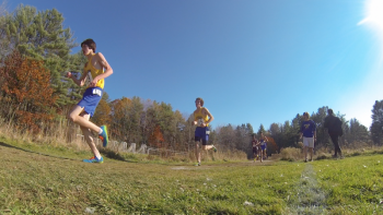 Jack Hasch and Matt Burnham keep the pressure on as Nick Scott encourages them from the sidelines. RYAN LEIGHTON/Boothbay Register Jack Hasch and Matt Burnham keep the pressure on as Nick Scott encourages them from the sidelines. RYAN LEIGHTON/Boothbay Register