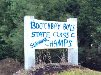 A proud town. A banner congratulating the state champs hung from the town sign at the Boothbay border on November 2. RYAN LEIGHTON/Boothbay Register